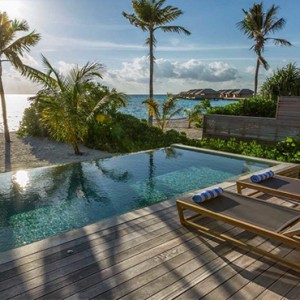 Hurawalhi Island - Luxury Maldives Honeymoon Packages - Beach Sunset Pool Villa ocean and pool view