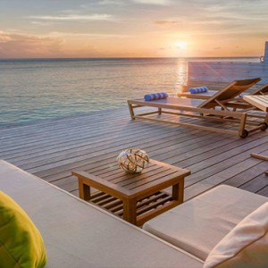 Hurawalhi Island - Luxury Maldives Honeymoon Packages - Ocean Villas deck at sunset