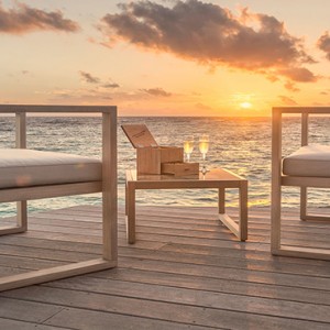 Hurawalhi Island - Luxury Maldives Honeymoon Packages - champagne pavillion at sunset