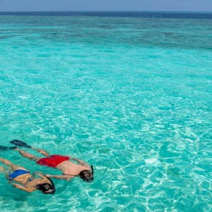 Hurawalhi Island - Luxury Maldives Honeymoon Packages - snorkeling