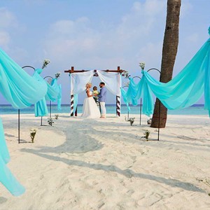 Hurawalhi Island - Luxury Maldives Honeymoon Packages - wedding on the beach