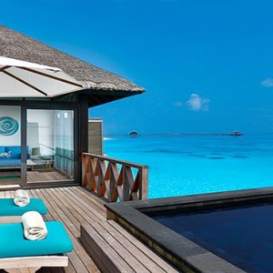 JA Manafaru - Luxury Maldives Honeymoon Packages - Sunrise water villas with infinity pools exterior 1