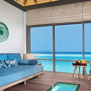 JA Manafaru - Luxury Maldives Honeymoon Packages - Sunrise water villas with infinity pools living room