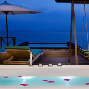 JA Manafaru - Luxury Maldives Honeymoon Packages - Sunset water villas with infinity pools bath view