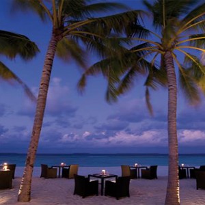 JA Manafaru - Luxury Maldives honeymoon packages - Ocean grill beach dining at night