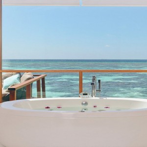 Kandolhu Maldives - Luxury Maldives Honeymoon Packages - Ocean Villa bathroom1