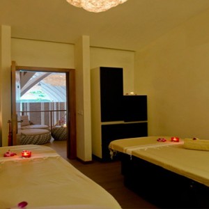 Kandolhu Maldives - Luxury Maldives Honeymoon Packages - spa treatment room