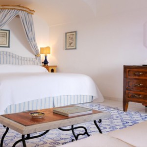 Le Sirenuse - Luxury Italy Honeymoon Packages - Pool Terrace view bed