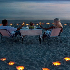 Lily Beach Resort and Spa at Huvahendhoo - Luxury Maldives Honeymoon Packages - Candlelit dining