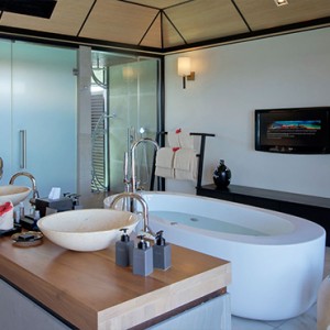 Lily Beach Resort and Spa at Huvahendhoo - Luxury Maldives Honeymoon Packages - Deluxe Water Villa bathroom