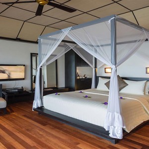 Lily Beach Resort and Spa at Huvahendhoo - Luxury Maldives Honeymoon Packages - Lagoon Villa bedroom