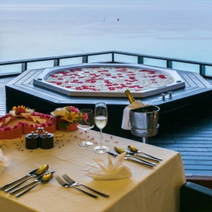 Lily Beach Resort and Spa at Huvahendhoo - Luxury Maldives Honeymoon Packages - Private spa dinner