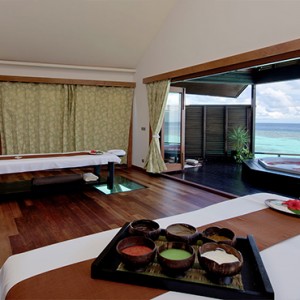 Lily Beach Resort and Spa at Huvahendhoo - Luxury Maldives Honeymoon Packages - Spa massage room