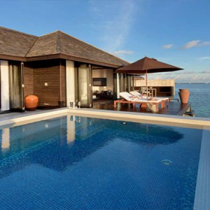 Lily Beach Resort and Spa at Huvahendhoo - Luxury Maldives Honeymoon Packages - Sunset Water Suite bathroom view