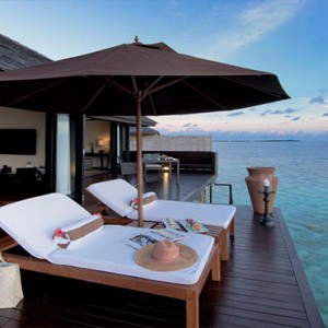 Lily Beach Resort and Spa at Huvahendhoo - Luxury Maldives Honeymoon Packages - Sunset Water Suite deck