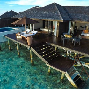 Lily Beach Resort and Spa at Huvahendhoo - Luxury Maldives Honeymoon Packages - Sunset Water Suite exterior