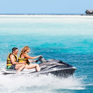 Lux South Ari Atoll - Luxury Maldives Honeymoon Packages - Jetskiing