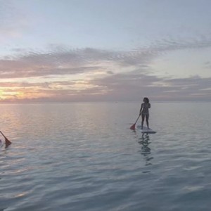 Lux South Ari Atoll - Luxury Maldives Honeymoon Packages - Paddle boarding