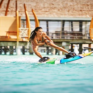 Lux South Ari Atoll - Luxury Maldives Honeymoon Packages - Surfboarding