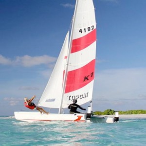 Lux South Ari Atoll - Luxury Maldives Honeymoon Packages - Topcat sailing