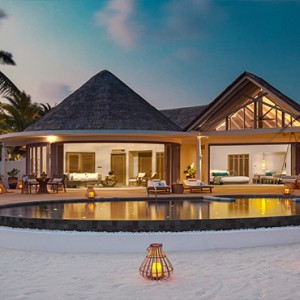 Milaidhoo Island Maldives - Luxury Maldives Honeymoon Packages - Beach Residence pool deck at sunset