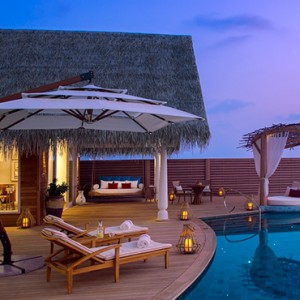 Milaidhoo Island Maldives - Luxury Maldives Honeymoon Packages - Ocean Residence pool deck at night