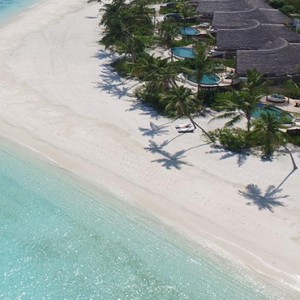 Milaidhoo Island Maldives - Luxury Maldives Honeymoon Packages - aerial view of beach and ocean