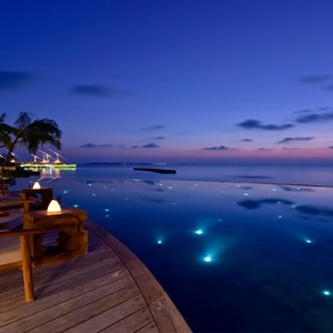 Milaidhoo Island Maldives - Luxury Maldives Honeymoon Packages - pool at night