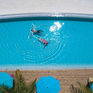 OBLU by Atmosphere at Helengali - Luxury Maldives Honeymoon Packages - Aerial view of adult only pool1