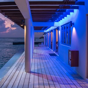 OBLU by Atmosphere at Helengali - Luxury Maldives Honeymoon Packages - Cooee Bistro exterior view at night