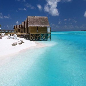 Ozen by Atmosphere at Maadhoo Island - Luxury Maldives Honeymoon Packages - Elena Spa treatment beach