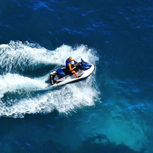 Ozen by Atmosphere at Maadhoo Island - Luxury Maldives Honeymoon Packages - Jet ski