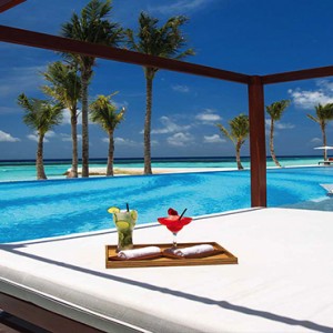 Ozen by Atmosphere at Maadhoo Island - Luxury Maldives Honeymoon Packages - Joie de vivre pool cabana