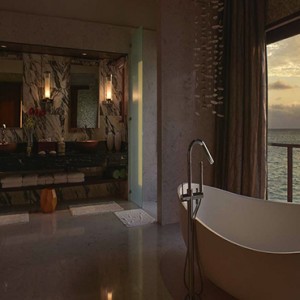 Ozen by Atmosphere at Maadhoo Island - Luxury Maldives Honeymoon Packages - OZEN Water suite bathroom