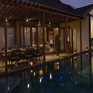 Ozen by Atmosphere at Maadhoo Island - Luxury Maldives Honeymoon Packages - OZEN Water suite exterior at night