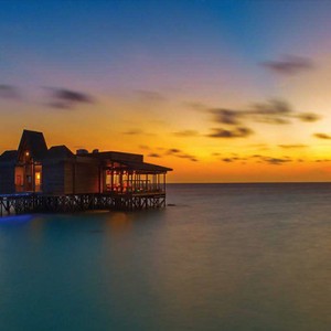 Ozen by Atmosphere at Maadhoo Island - Luxury Maldives Honeymoon Packages - Traditions restaurants sunset