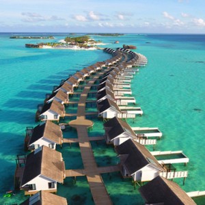 Ozen by Atmosphere at Maadhoo Island - Luxury Maldives Honeymoon Packages - aerial view of wind villas and suites