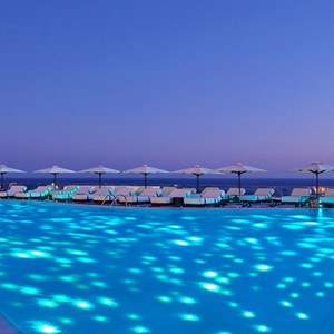 Royal Myconian Hotel and Thalassa Spa - Luxury Greece Honeymoon Packages - pool at night