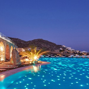 Royal Myconian Hotel and Thalassa Spa - Luxury Greece Honeymoon Packages - pool at night1