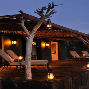 Samara Private Game Reserve - Luxury South Africa Honeymoon Packages - Sibella Suites exterior at night