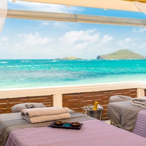 Serenity at Coconut Bay - Luxury St lucia Honeymoon Packages - Outdoor Couples spa massage with view