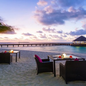 Sun Aqua Vilu Reef - Luxury Maldives honeymoon packages - Well done restaurant exterior on beach