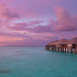 Sun Aqua Vilu Reef - Luxury Maldives honeymoon packages - overwater villas at sunset