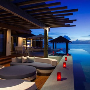 Velassaru Maldives - Luxury Maldives Honeymoon Packages - Water Suite exterior at night