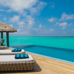 Velassaru Maldives - Luxury Maldives Honeymoon Packages - Water Suite sun loungers on deck