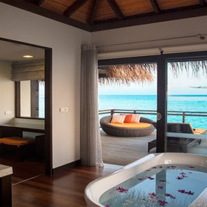 Velassaru Maldives - Luxury Maldives Honeymoon Packages - Water Villa bathroom with a view