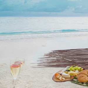 Vivanta By Taj - Coral Reef - Luxury Maldives Honeymoon Packages - Champagne breakfast on beach