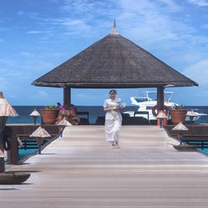 Vivanta By Taj - Coral Reef - Luxury Maldives Honeymoon Packages - Jetty walkway to reception