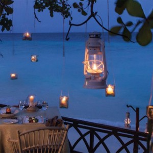 Vivanta By Taj - Coral Reef - Luxury Maldives Honeymoon Packages - Romanic escapade to a blue lagoon at night