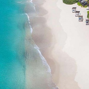 Keyonna Beach - Luxury Antigua Honeymoon Packages - Beach with bali beds aerial view